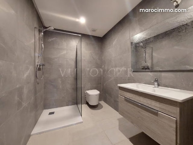 Location Très bel appartement rez de jardin 100m2 Bouskoura — 5