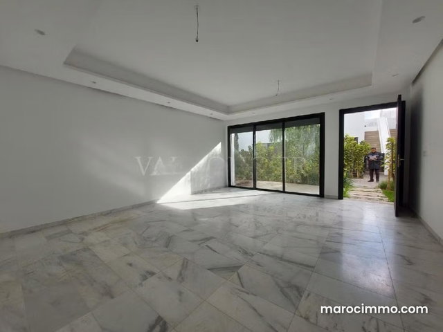 Superbe appartement Rez de jardin à louer 100m2 Bouskoura — 2