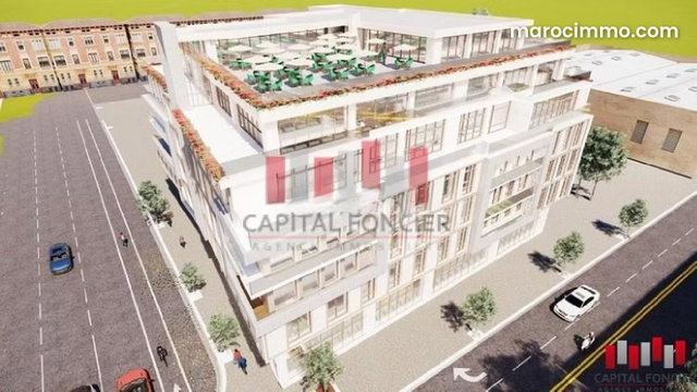 Immeuble neuf R 5 de 4.900 m de surface utile a la location en plein quartier CIL Ref i 22 8 — 2