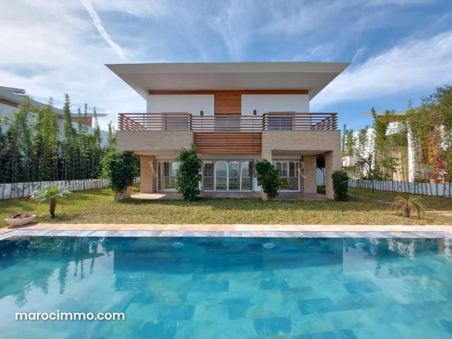 Location magnifique villa front de Golf 5 suites 1000m2, Bouskoura ville verte — 2
