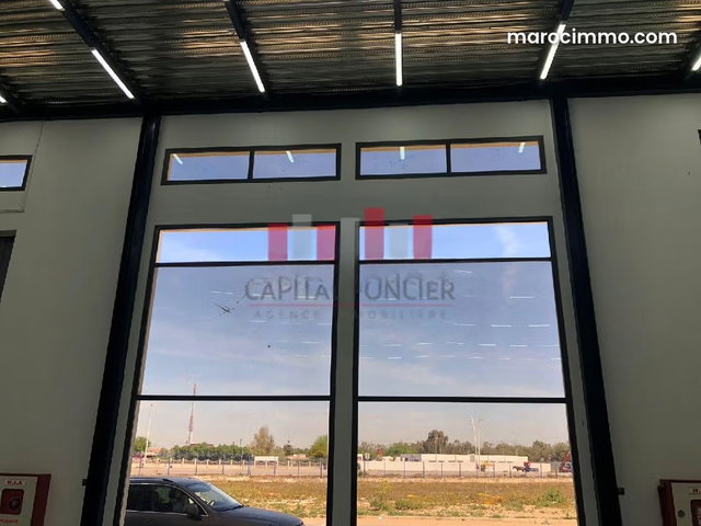 Hangar neuf de 1200 m de surface exploitable aux meilleures normes internationales a la location au sein du parc industriel Sapino idéal pour entreposage — 2
