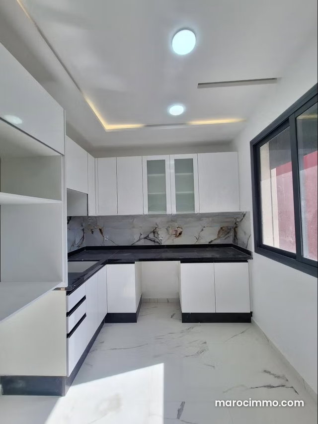 Apartment for Sale in Martil. Total Surface 50 m². Parabolic System and Secure Residence. — 5