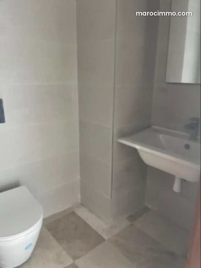 Location appartement 2 chambres, NEUF, AVEC VUE MER, à 7 minutes du morocco mall dans une résidence securisée. Jardin, piscine — 3