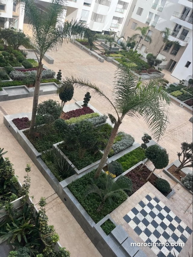 Location appartement 2 chambres, NEUF, AVEC VUE MER, à 7 minutes du morocco mall dans une résidence securisée. Jardin, piscine — 2
