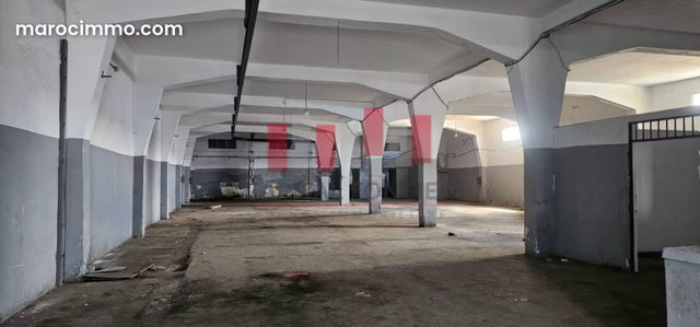 Hangar industriel de 980 m2 a la location zone industrielle ai sebaa idéal pour stockage ou production — 2