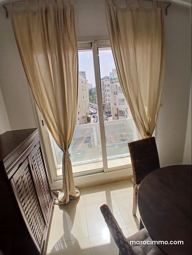 Racine Massira Très beau salon 1ch meublé 75m2 balcon haut standing — 4