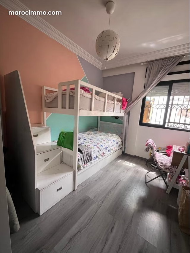 Bel appartement de 3 chambres à vendre au quartier des Hôpitaux. Superficie 112 m². Salon Marocain, salon européen sécurité — 3