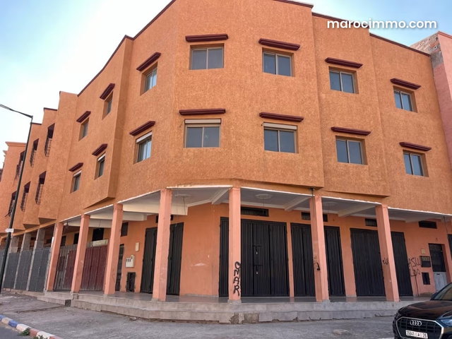 Maison R2 et grand local commercial — 2