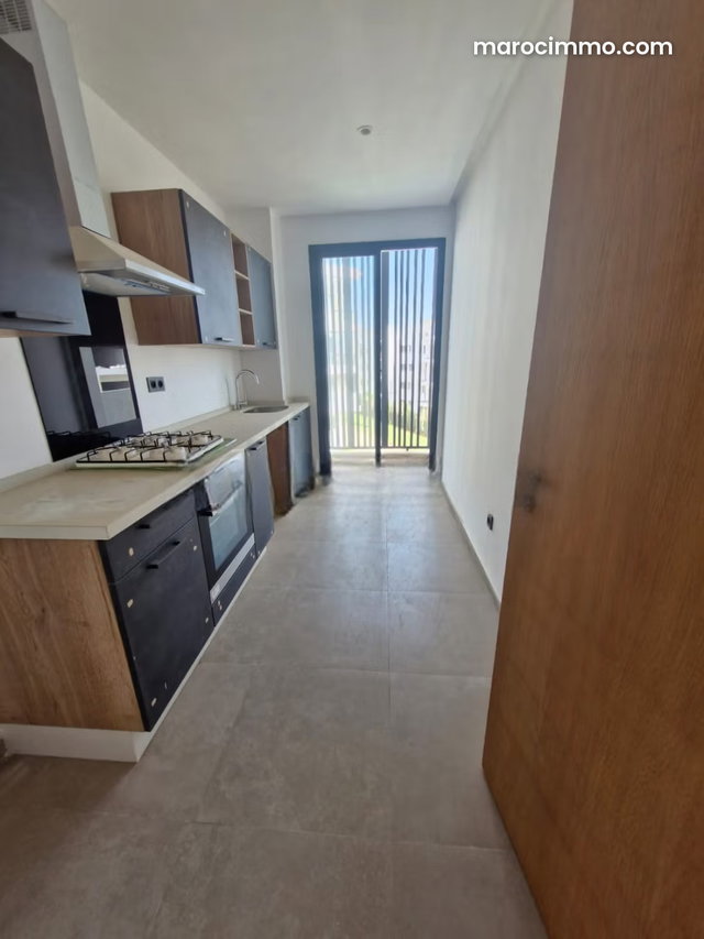 Bel appartement en location à Casablanca Finance City. Surface totale 130 m². Porte blindée et chauffage central — 5