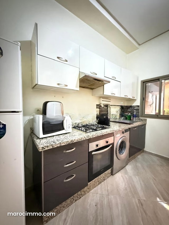 À Vendre: Bel appartement meublé – Rez de jardin à Jnane Aourad 73 m² — 5