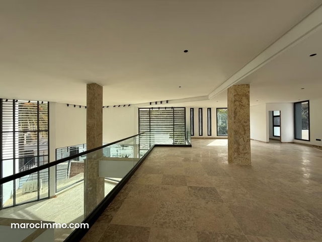 Local commercial pour location Agdal. Surface de 1000 m². Porte sécurisée et chauffage central — 5