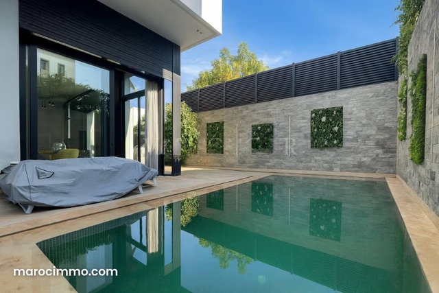 Vente magnifique villa moderne 4 suites, piscine et rooftop avec vue mer à Dar Bouazza — 2
