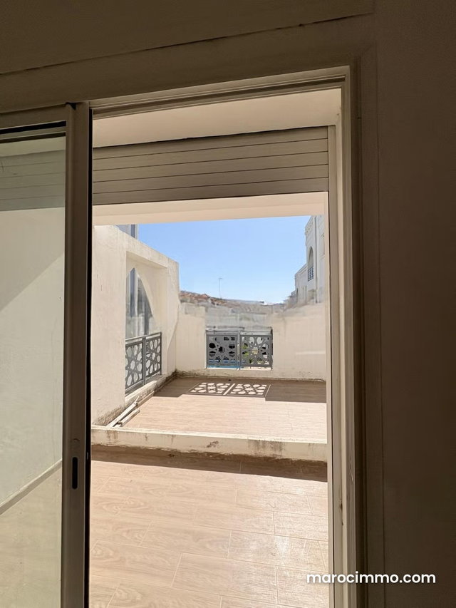 Appartement à vendre à Nouinouiche: 2 chambres salon cuisine américaine et parking souterrain dans résidence avec piscine — 2