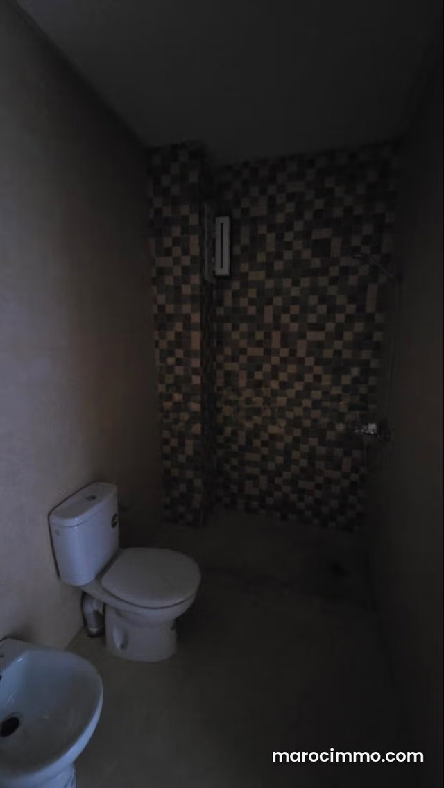Appartement en vente à M'Diq. 2 chambres. Salon Marocain, sécurité — 4