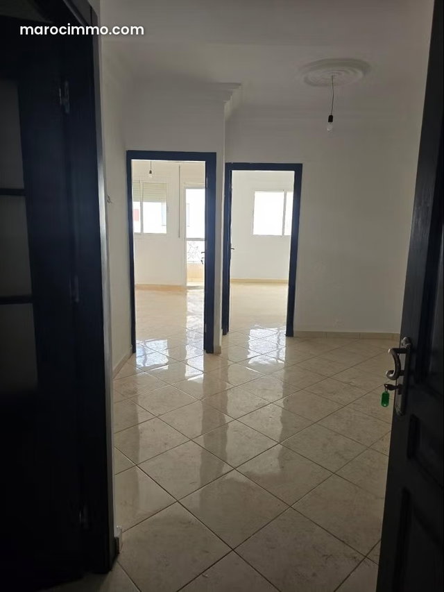 Vente d'un bel appartement à Martil. 2 chambres agréables. Espaces verts et ascenseur — 5