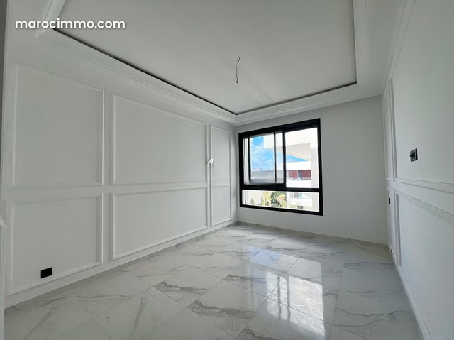 Superbe appartement neuf à la location, à Ain Diab Extension, dans une résidence fermée avec piscine et parc paysagé à 5min du Morocco Mall — 2