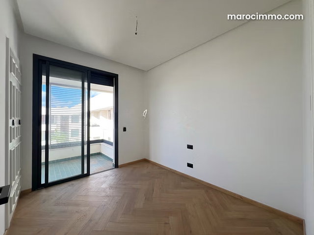 Superbe appartement neuf à la location, à Ain Diab Extension, dans une résidence fermée avec piscine et parc paysagé à 5min du Morocco Mall — 5