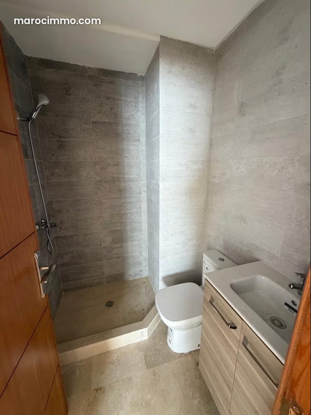 Find an apartment to buy in Ibn Batouta Madina Jadida. 3 large living rooms. Well-equipped kitchen — 3