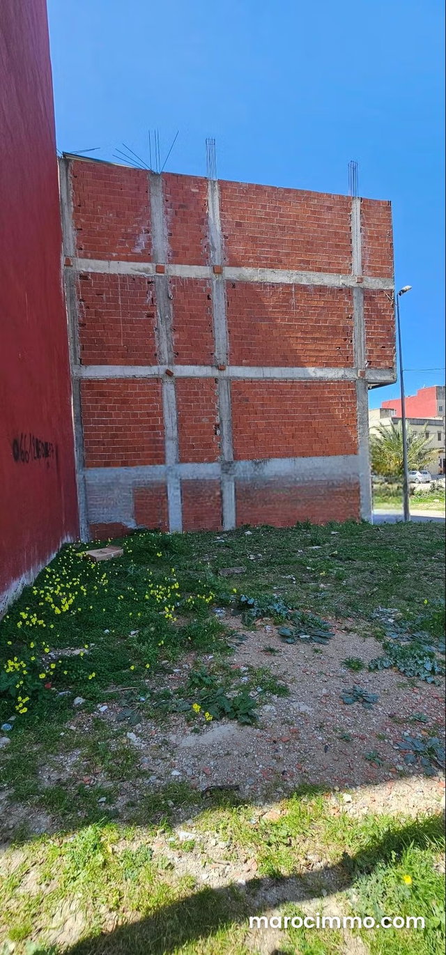 RARE à Moujahidine Terrain 2 façades vue golfe R2 — 2
