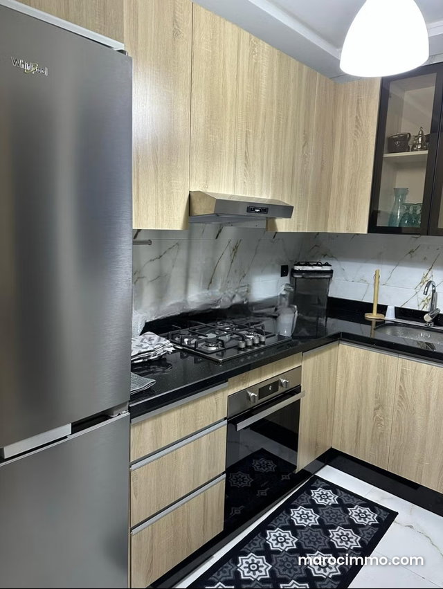 Louez cet appartement à Hay Hassani. Surface de 96 m². Concierge et climatisation — 4
