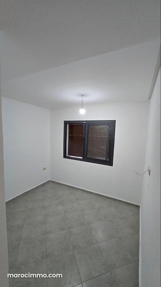 Superb 2-Bedroom Apartment for Sale in Martil. Mountain Views and Secure Entrance — 5