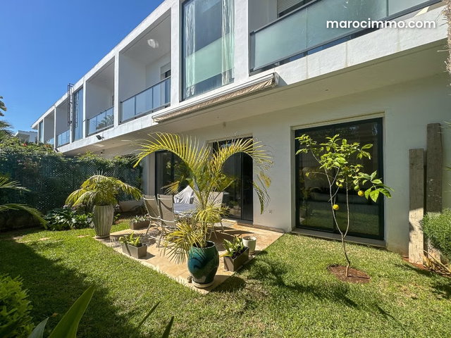 Villa à louer Dar Bouazza – Architecture contemporaine, jardin paysagé, résidence sécurisée avec piscine — 5