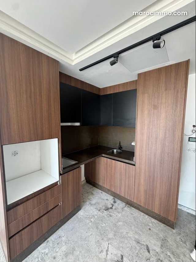 Vente d'un bel appartement à Palmier. Surface totale 49 m². Salon typique marocain, résidence sécurisée — 2