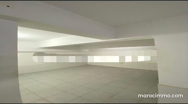 Louez ce local commercial à Hay Mohammadi. Surface de 65 m². Porte sécurisée — 2