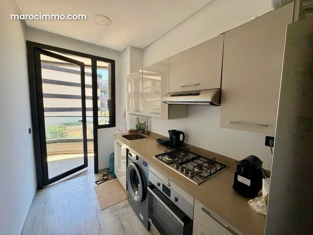 Superbe appartement à louer à Casablanca Finance City. Superficie 80 m². Bien meublé — 5