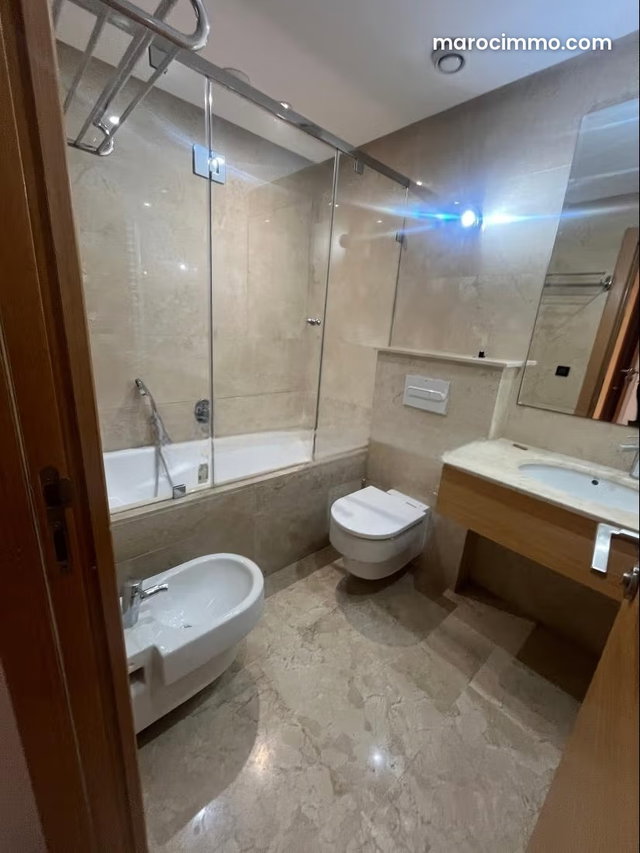 Bouskoura ville verte: Vente bel appartement 2 chambres et une 3 eme pièce séjour ou bureau ou sup 119 m2 — 3