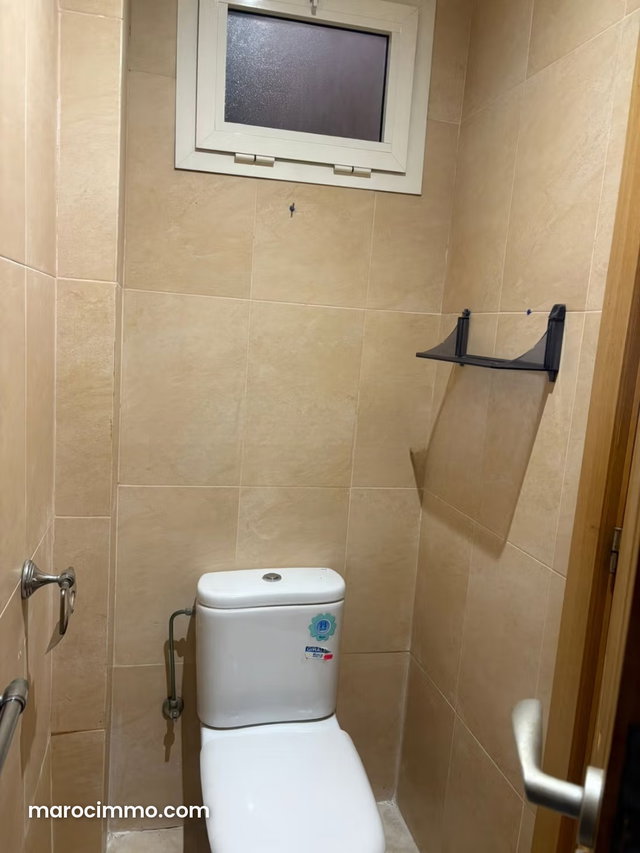 Bel appartement à vendre en Hassan Centre Ville. 3 pièces. Salon traditionnel marocain, résidence sécurisée — 5