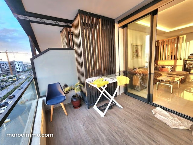 Rent this apartment in Casablanca Finance City. 2 bedrooms. With elevator and terrace — 5