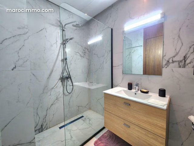 Rent this apartment in Casablanca Finance City. 2 bedrooms. With elevator and terrace — 3