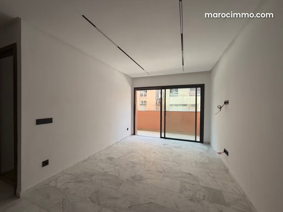 Appartement à louer à Guéliz. Surface 40 m². Gardien et climatisation