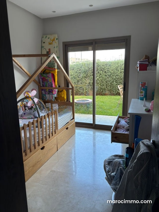 À Vendre – Superbe Appartement en Rez de Jardin aux Joyaux de Bouskoura – Ville Verte — 5