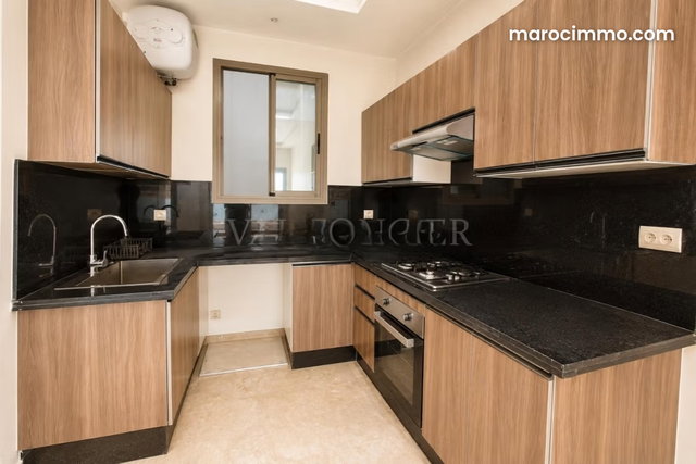 Location Appartement Neuf 2chambres avec terrasse Quartier des Hôpitaux, Casablanca — 3