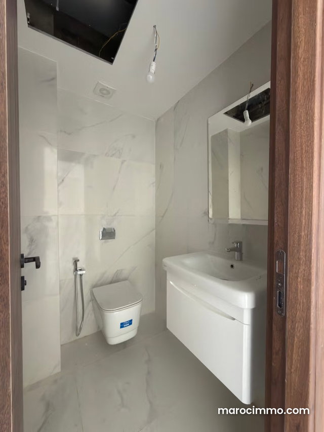 Appartement de 91 m² avec parking à Bouarrakia — 5