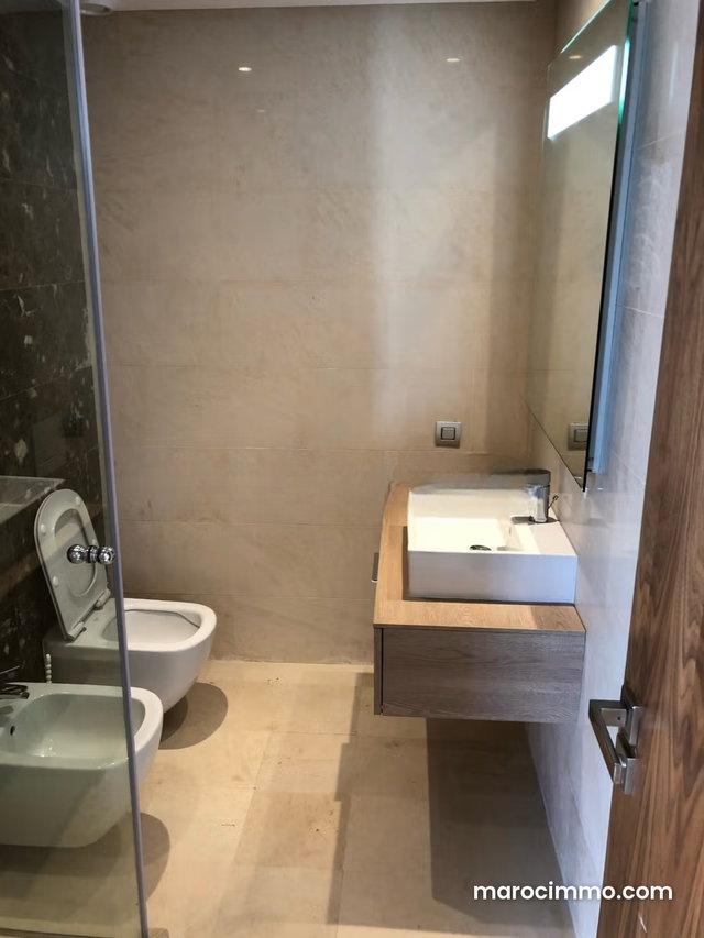 Appartement sobre à louer en résidence fermée au CFC — 3