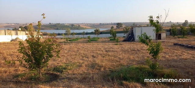 À VENDRE – Superbe fermette de 2 500 m² avec vue exceptionnelle sur le barrage — 3