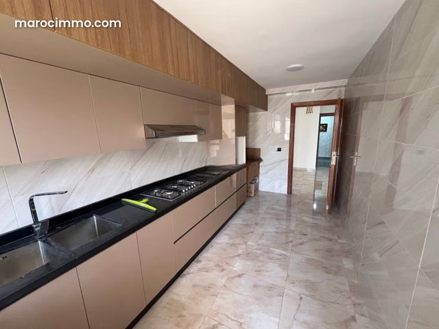 Rent this apartment in Harhoura. 150 m². Traditional Moroccan living room, secure residence — 3