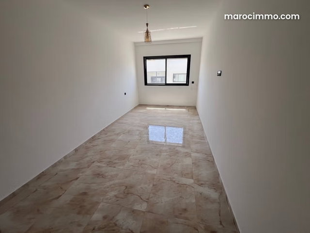 Rent this apartment in Harhoura. 150 m². Traditional Moroccan living room, secure residence — 5