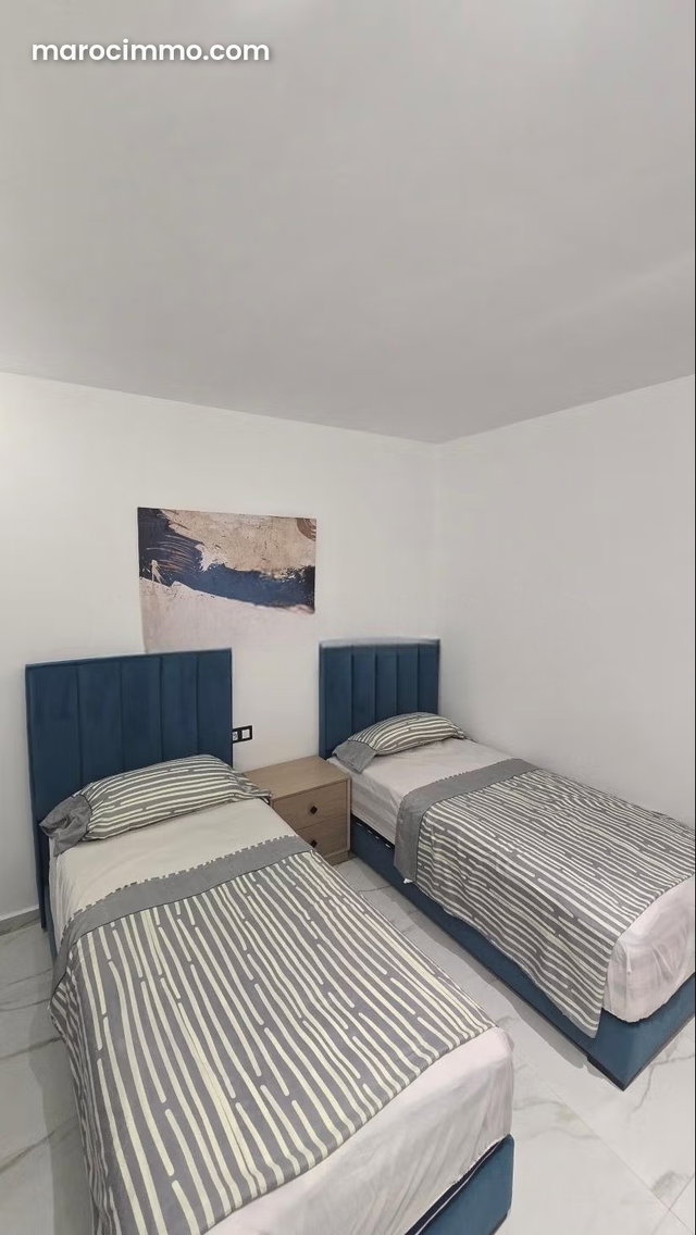 Bel appartement en location à M'Diq. Surface de 80 m². Meublé — 5