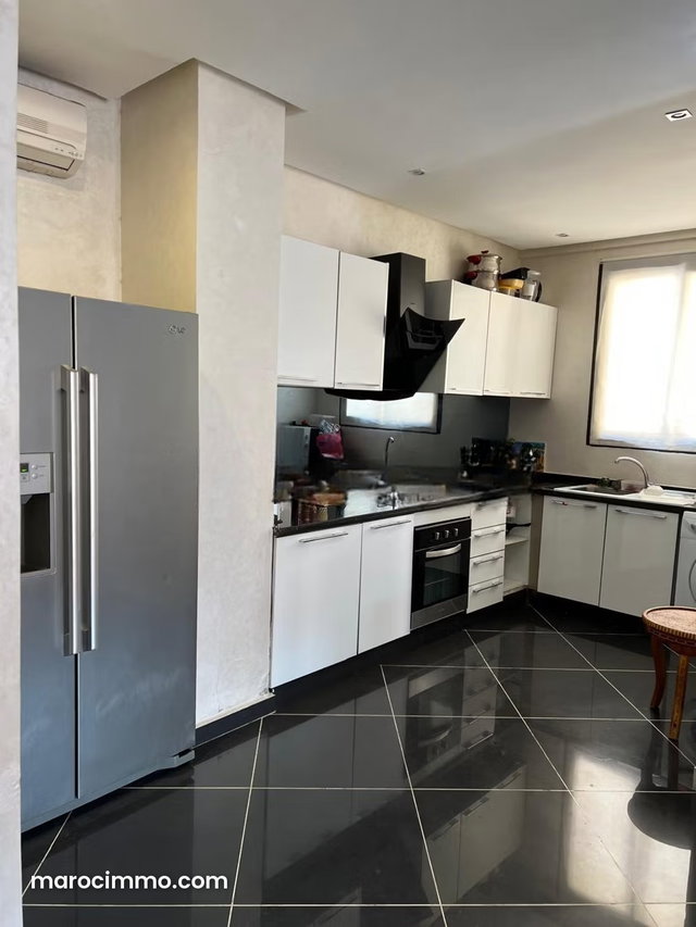 Superbe appartement à louer à Guéliz. Surface de 85 m². Bien meublé — 5