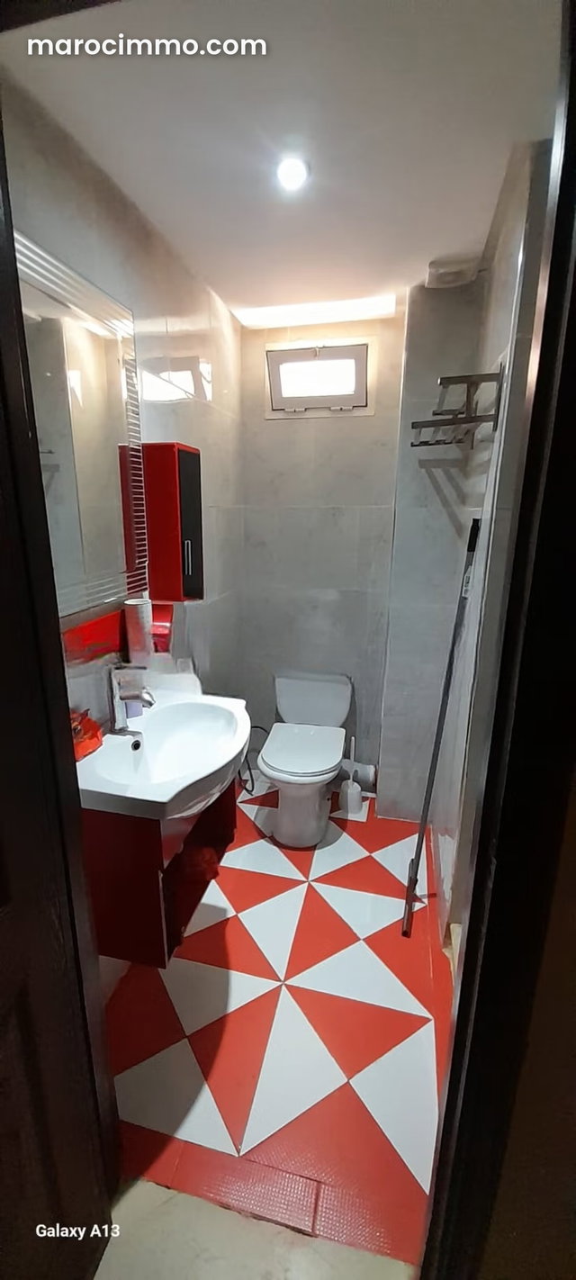 Superbe appartement à louer à Massira 1. Superficie 60 m². Salon traditionnel marocain, résidence sécurisée — 3