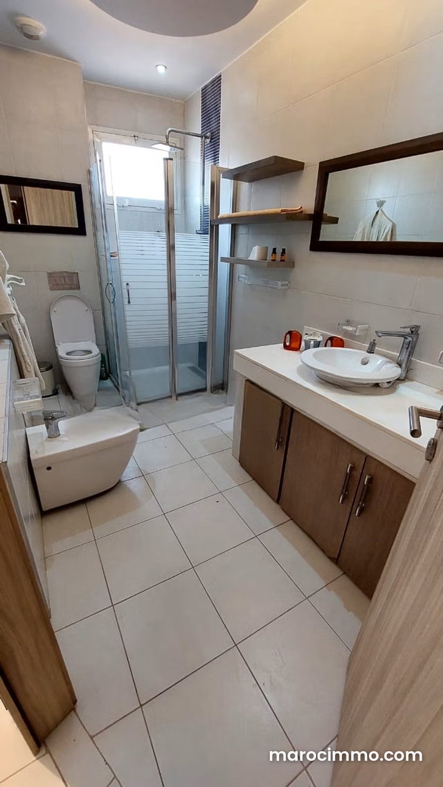Rent this apartment in Casablanca Finance City. 3 bedrooms. Fully furnished — 4